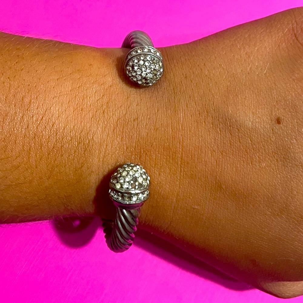 silver braided banded bracelet. With diamonds